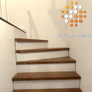 Деревянная лестница на металлическом модульном каркасе